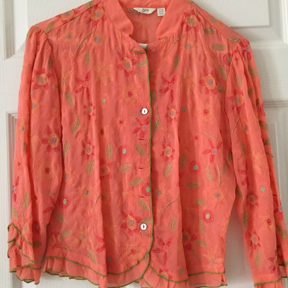 orange print ruffled blouse